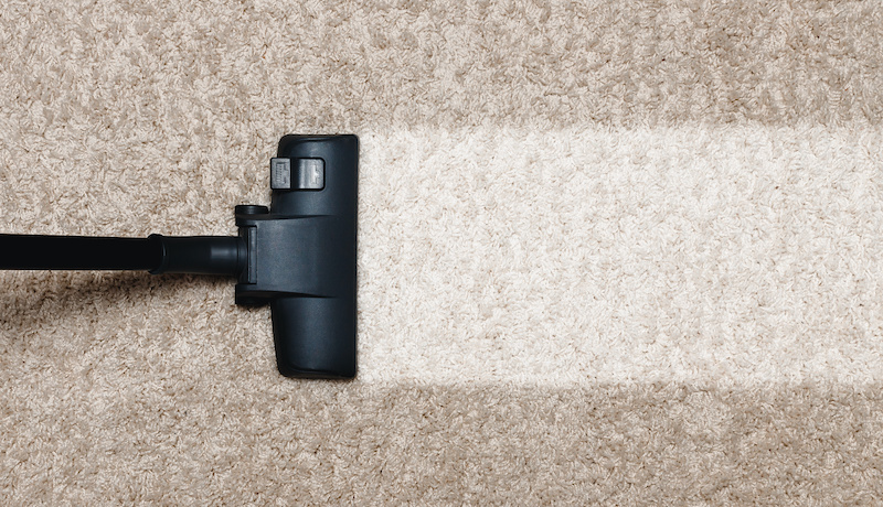 Cleaning white with pile carpet vacuuming at home